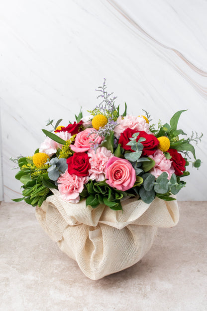 Viva la Vida // Red Rose, Light Rose, and Pink Carnation in a Fishbowl