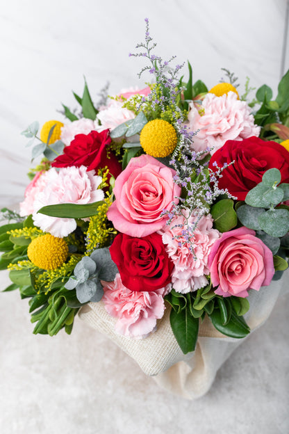 Viva la Vida // Red Rose, Light Rose, and Pink Carnation in a Fishbowl