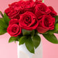 12 Rosas Rojas con Florero de Rostro - Flores